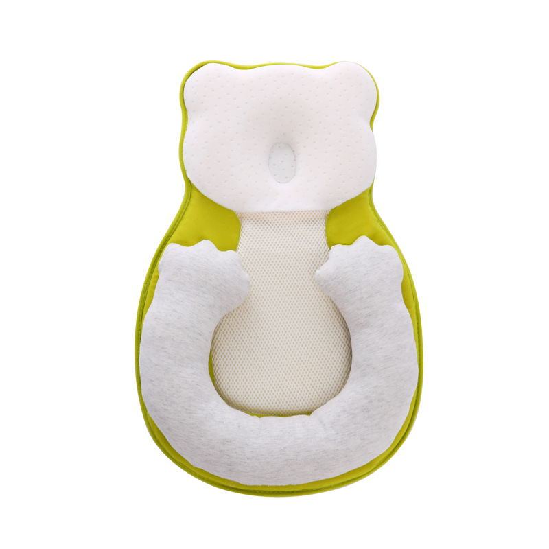 baby sleeping in soft baby lounger travel bed