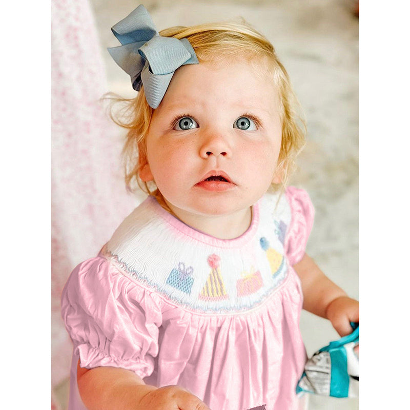 Birthday Girl Smocked Romper in Pink with Pleats and Stitches